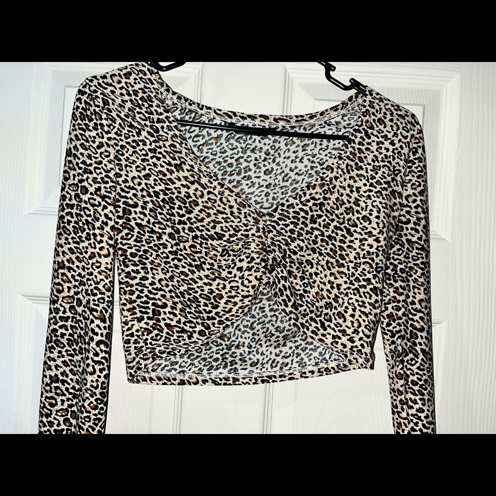 this is a leopard print top from shein! it has been worn once and is very light!